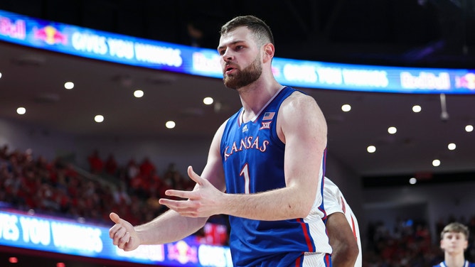 Kansas Jayhawks center Hunter Dickinson reacts after a call during a game against the Houston Cougars.
