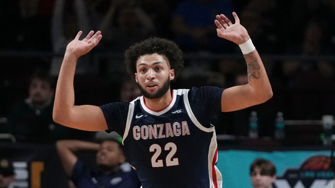 Gonzaga Bulldogs forward Anton Watson celebrates making a basket against the Saint Mary's Gaels during the championship game of the WCC Tournament.