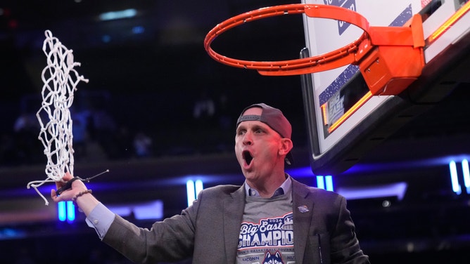 UConn Huskies head coach Dan Hurley celebrates beating the Marquette Golden Eagles to capture the Big East Tournament Championship.