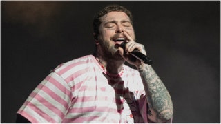 Post Malone looks noticeably different after losing a lot of weight. How did he lose so much weight? Check out a current photo of him. (Credit: Getty Images)
