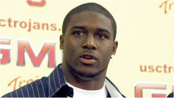 Former USC Trojans star Reggie Bush reportedly is getting his Heisman back. Check out the reactions on social media. (Credit: Getty Images)