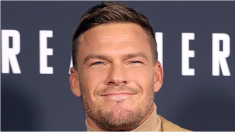 "Reacher" star Alan Ritchson was slammed by the National Fraternal Order of Police after saying cops murder people. (Credit: Getty Images)