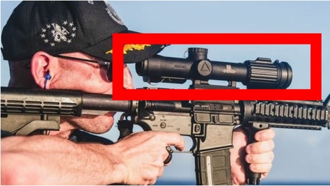 Was the Navy's embarrassing rifle photo actually photoshopped and edited? A photo expert believes the backwards optic was added after the fact. (Credit: Navy)