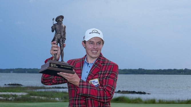 Matthew Fitzpatrick poses with the champions trophy after winning the 2024 RBC Heritage. (David Yeazell-USA TODAY Sports)