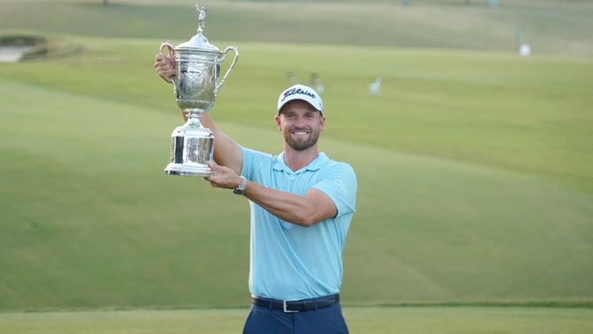 Wyndham Clark poses with the championship trophy after winning the 2023 U.S. Open at the Los Angeles Country Club. (Michael Madrid-USA TODAY Sports)