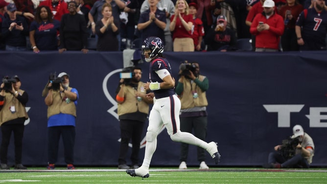 Houston Texans QB C.J. Stroud runs off the field after throwing a TD vs. the Cleveland Browns in a 2024 AFC wild card game at NRG Stadium. (Thomas Shea-USA TODAY Sports)