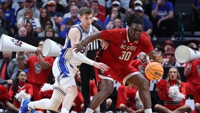 NC State Wolfpack big DJ Burns Jr. posts up Duke Blue Devils C Kyle Filipowski during the Elite Eight of the 2024 NCAA Tournament at American Airline Center in Dallas. (Tim Heitman-USA TODAY Sports)