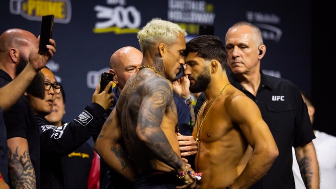 Charles Oliveira faces off with Arman Tsarukyan during ceremonial weigh ins for UFC 300 at MGM Grand Garden Arena in Las Vegas. (Mark J. Rebilas-USA TODAY Sports)