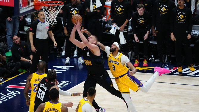 Los Angeles Lakers PF Anthony Davis fouls Denver Nuggets C Nikola Jokic during Game 2 during the 2024 NBA playoffs at Ball Arena in Colorado. (Ron Chenoy-USA TODAY Sports)