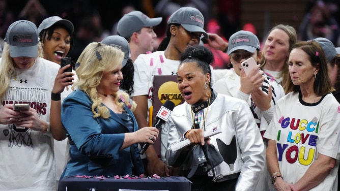 South Carolina Gamecocks head coach Dawn Staley talks to ESPN's Holly Rowe after beating Iowa in the National Championship. 