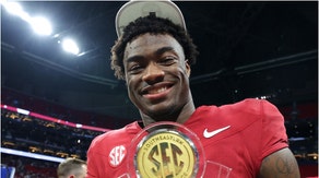 Alabama quarterback Jalen Milroe doesn't seem too interested in talking about if Michigan cheated. He was asked about it on “Bussin' With The Boys." (Credit: Getty Images)
