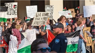 A thunderous "USA! USA! USA!" chant drowned out anti-Israel protests at the University of Alabama. Watch a video of the protest. (Credit: Mark Hughes Cobb/The Tuscaloosa News / USA TODAY NETWORK)