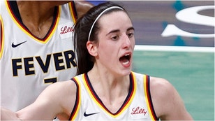 The refs missed an obvious foul call committed against Caitlin Clark. Watch the no-call during Indiana's loss to the Seattle Storm. (Credit: Getty Images)