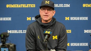 Jim Harbaugh received a four-year show-cause penalty from the NCAA on Wednesday, including a one-year suspension, stemming from violations at Michigan. 