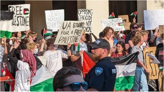 A thunderous "USA! USA! USA!" chant drowned out anti-Israel protests at the University of Alabama. Watch a video of the protest. (Credit: Mark Hughes Cobb/The Tuscaloosa News / USA TODAY NETWORK)