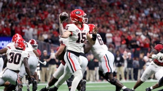 Georgia Bulldogs QB Carson Beck drops back to pass vs. the Alabama Crimson Tide in the 2023 SEC title game at Mercedes-Benz Stadium in Atlanta. (Jordan Godfree-USA TODAY Sports)