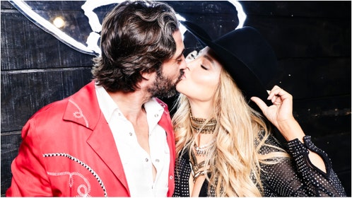 "Yellowstone" stars Hassie Harrison and Ryan Bingham are married. What are the details of the wedding? (Credit: Getty Images)