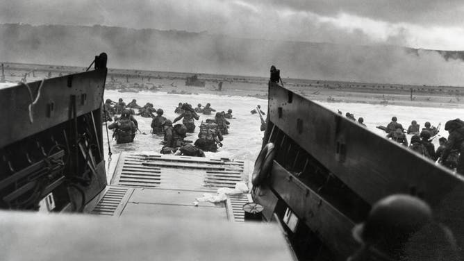 Americans from the 1st US Infantry land at Omaha Beach on D-Day, June 6 1944. Omaha proved to be the toughest of the Normandy beaches to land at; 2,400 died in the first wave of the invasion. (Credit: Getty Images)