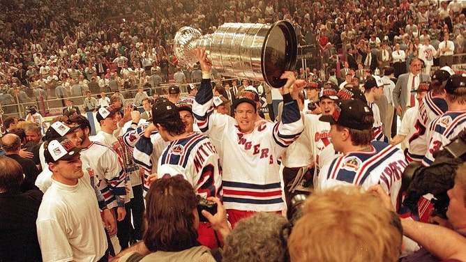 New York Rangers legend Mark Messier raises the Stanley Cup defeating the Vancouver Canucks at Madison Square Garden in 1994. (David E. Klutho/Sports Illustrated via Getty Images)
