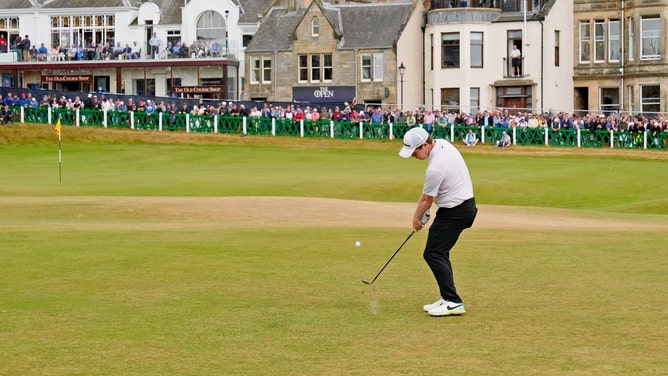 Robert MacIntyre hits an approach shot on the 18th hole during the final round of the 150th Open Championship at St. Andrews Old Course in Scotland. (Michael Madrid-USA TODAY Sports)