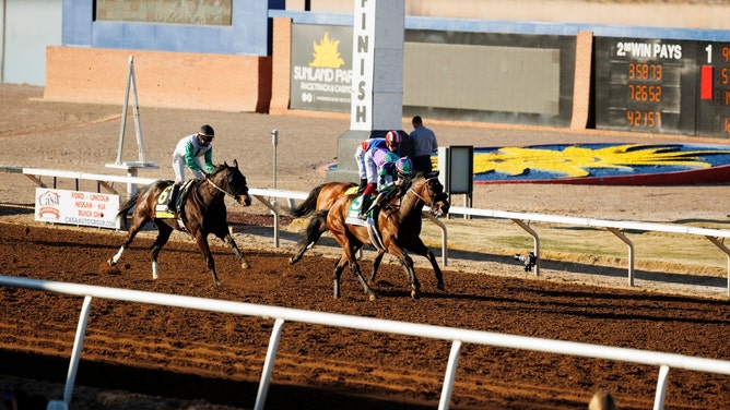 Jockey Joel Rosario and Stronghold cross the finish line to win the Grade III Stakes Sunland Park Derby in New Mexico. (Ivan Pierre Aguirre/USA TODAY NETWORK)