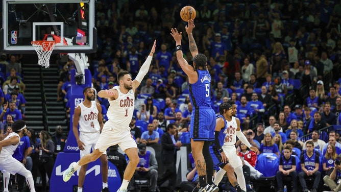 Orlando Magic PF Paolo Banchero shoots a fadeaway over Cleveland Cavaliers SG Max Strus in Game 3 of the 1st round for the 2024 NBA playoffs at Kia Center in Florida. (Mike Watters-USA TODAY Sports)