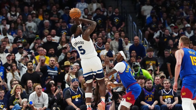 Minnesota Timberwolves SG Anthony Edwards shoots a fadeaway over Nuggets SG Kentavious Caldwell-Pope in Game 1 of the Western Conference Semifinals of the 2024 NBA Playoffs at Ball Arena in Denver. (Ron Chenoy-USA TODAY Sports)