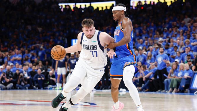 Dallas Mavericks All-Star Luka Doncic drives toward the paint on Thunder PG Shai Gilgeous-Alexander in Game 2 in the second round of the 2024 NBA Playoffs at Paycom Center in Oklahoma City. (Alonzo Adams-USA TODAY Sports)