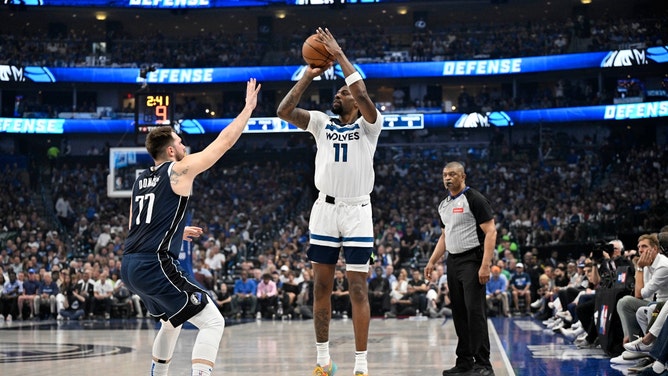 Minnesota Timberwolves big Naz Reid shoots a three vs. the Dallas Mavericks during Game 3 of the Western Conference Finals in the 2024 NBA Playoffs. (Jerome Miron-USA TODAY Sports)