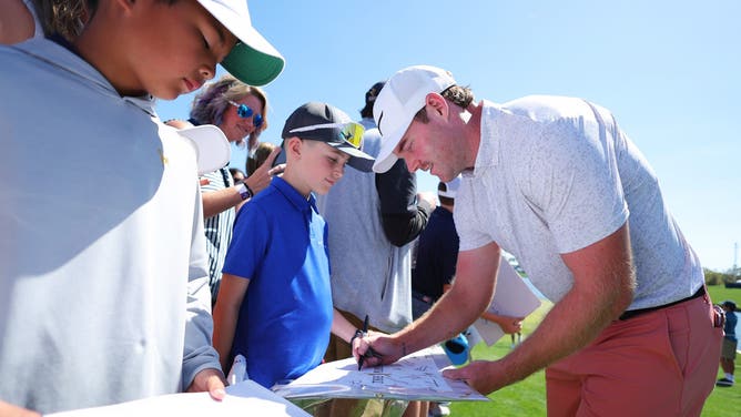 Grayson Murray of the United States signs autographs during a practice round prior to THE PLAYERS Championship on the Stadium Course at TPC Sawgrass on March 12, 2024 in Ponte Vedra Beach, Florida. (Photo by Kevin C. Cox/Getty Images)