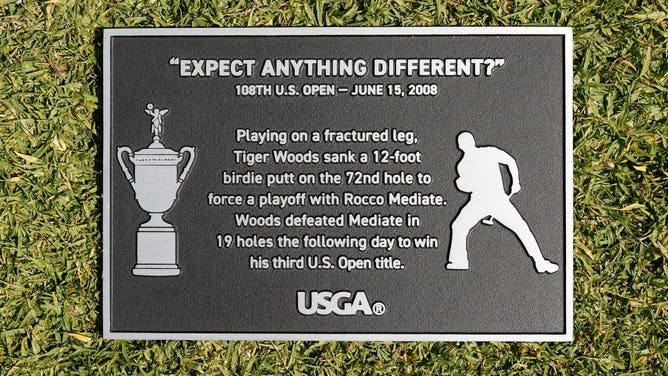 A plaque commemorating Tiger Woods winning the 2008 U.S. Open.