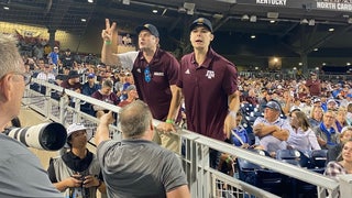 Two Texas A&M fans were tossed from the College World Series after taunting and yelling at Florida coaches. 
Via: Connor Happer