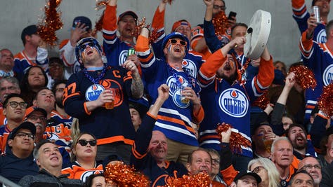 edmonton oilers fan flashes her boobs during win over dallas stars