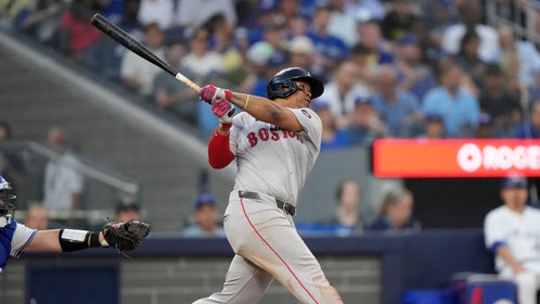Boston Red Sox 3B Rafael Devers hits a double against the Toronto Blue Jays at Rogers Centre in Canada. (John E. Sokolowski-USA TODAY Sports)