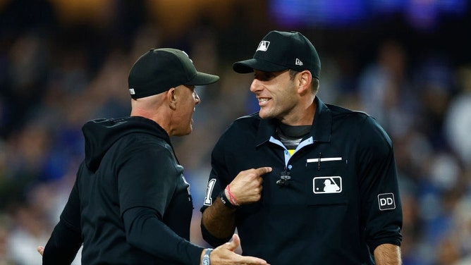 Chicago White Sox manager Pedro Grifol argues a call with MLB home plate umpire Pat Hoberg in the sixth inning against the Los Angeles Dodgers at Dodger Stadium. (Ronald Martinez/Getty Images)