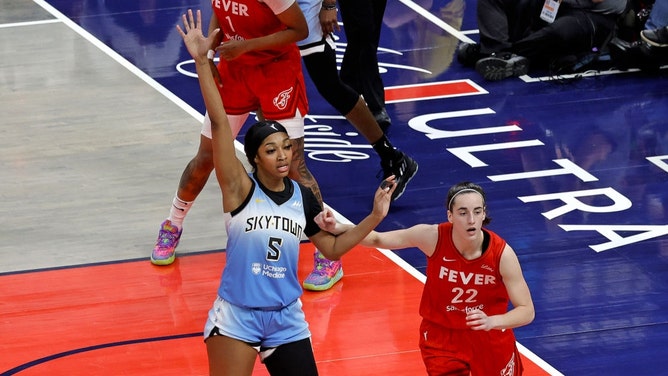 Chicago Sky forward Angel Reese posts up Fever SG Caitlin Clark at Gainbridge Fieldhouse in Indianapolis. (Brian Spurlock/Icon Sportswire via Getty Images)