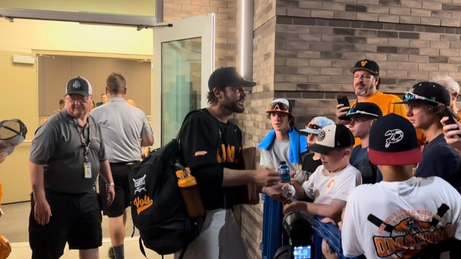 Tony Vitello signed autographs for fans after Tennessee captured its first national championship in college baseball. 