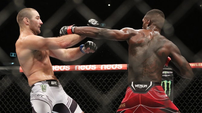 Israel Adesanya mixing it up with Sean Strickland during UFC 293 at Qudos Bank Arena in Sydney, Australia. (Jasmin Frank-USA TODAY Sports)