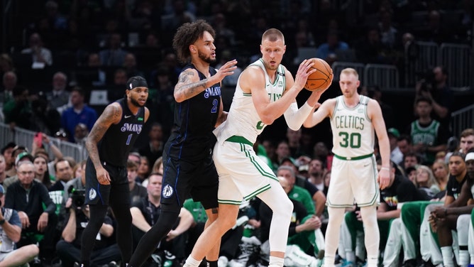 Boston Celtics C Kristaps Porzingis posts up Dallas Mavericks C Dereck Lively II during Game 1 of the 2024 NBA Finals. (David Butler II-USA TODAY Sports)