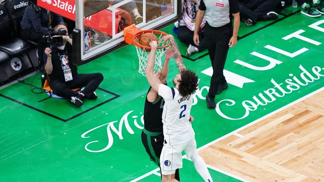 Dallas Mavericks C Dereck Lively II dunks on Celtics SG Derrick White in Game 2 of the 2024 NBA Finals at TD Garden in Boston. (David Butler II-USA TODAY Sports)