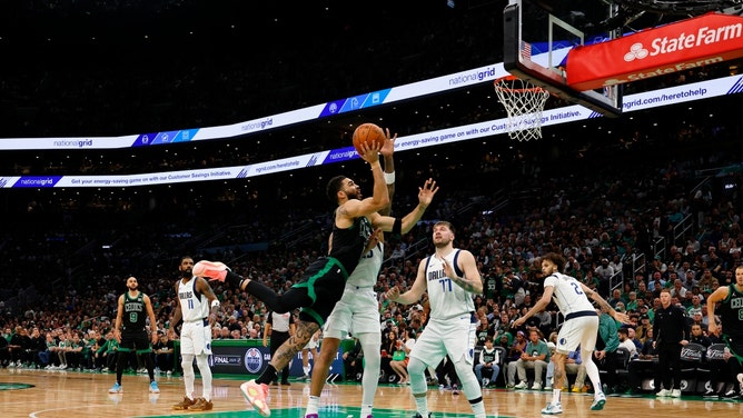 Boston Celtics All-Star Jayson Tatum gets into the paint against the Dallas Mavericks in Game 2 of the 2024 NBA Finals at TD Garden. (Peter Casey-USA TODAY Sports)