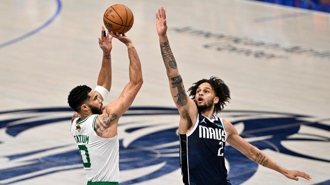 Boston Celtics SF Jayson Tatum shoots over Mavericks C Dereck Lively II in Game 3 of the 2024 NBA Finals at American Airlines Center in Dallas. (Jerome Miron-USA TODAY Sports)