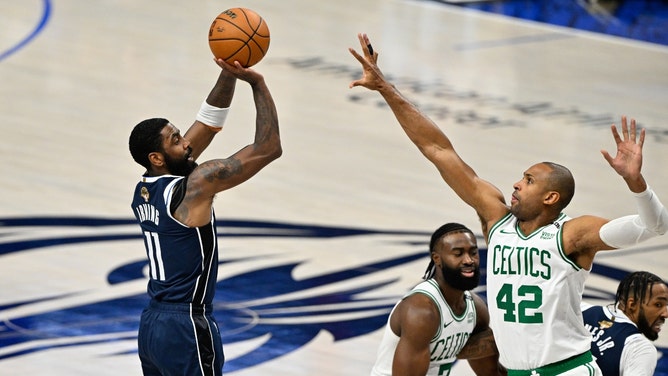 Mavericks SG Kyrie Irving shoots a fadeaway over Boston Celtics C Al Horford in the 2024 NBA Finals at American Airlines Center in Dallas. (Jerome Miron-USA TODAY Sports)