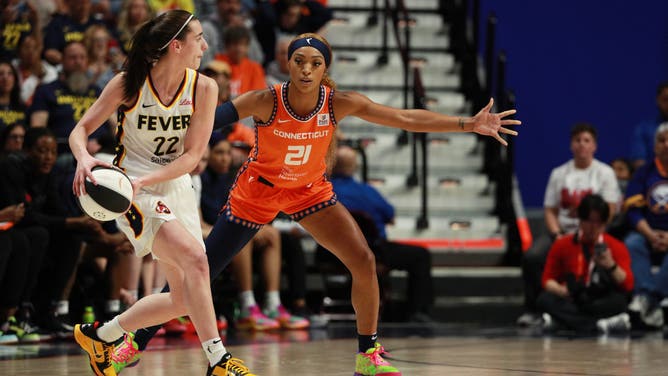 Connecticut Sun guard DiJonai Carrington guards Indiana Fever rookie Caitlin Clark during the first half of a game at Mohegan Sun Arena in Uncasville, Connecticut.