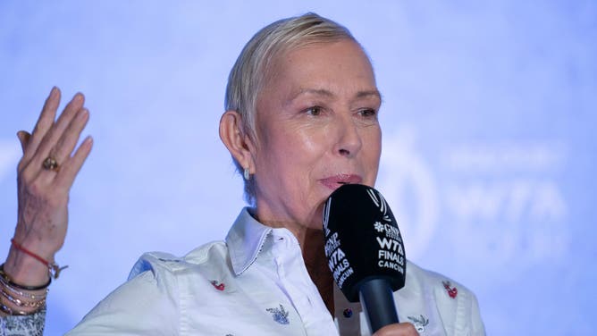 Tennis legend Martina Navratilova fired back at a reporter who called her "transphobic" for advocating to keep biological males out of women's sports.