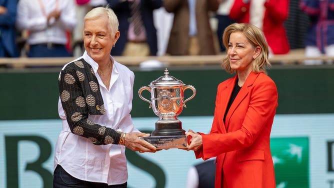 Tennis legends Martina Navratilova and Chris Evert prepare to present the winner's trophy to Iga Świątek of Poland after the Women's Singles Final on Court Philippe-Chatrier at the 2024 French Open Tennis Tournament at Roland Garros on June 8th, 2024, in Paris, France. (Photo by Tim Clayton/Corbis via Getty Images)