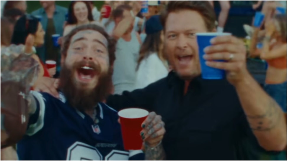 Post Malone dropped an awesome music video for "Pour Me A Drink" with Blake Shelton. Watch the music video. (Credit: Screenshot/YouTube video https://www.youtube.com/watch?v=RoeXmaSE7Lo)