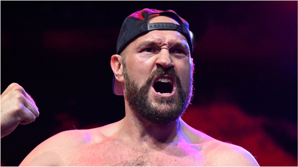 Boxer Tyson Fury appeared to be in rough shape as he was removed from a bar. He appeared to hit the sidewalk outside the bar. Watch a video of the incident. (Credit: Getty Images)