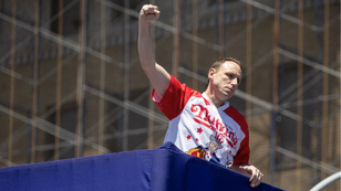 Joey Chestnut Smashes 57 Hot Dogs In 5 Minutes, Raises $106K For Military Families