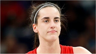 Caitlin Clark gave a young fan her shoes after the Indiana Fever beat the Minnesota Lynx. Watch a video of the awesome moment. (Credit: Getty Images)